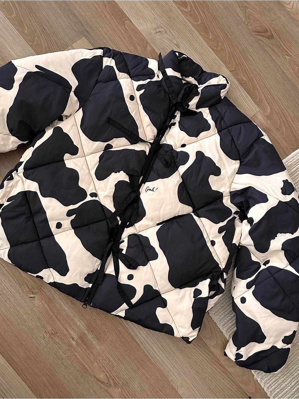 Lisa Says Gah cow print puffer jacket